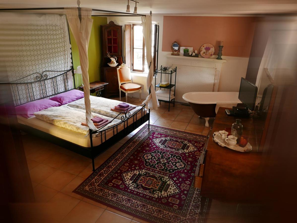 Affittacamere Casa Archi ロゾネ エクステリア 写真